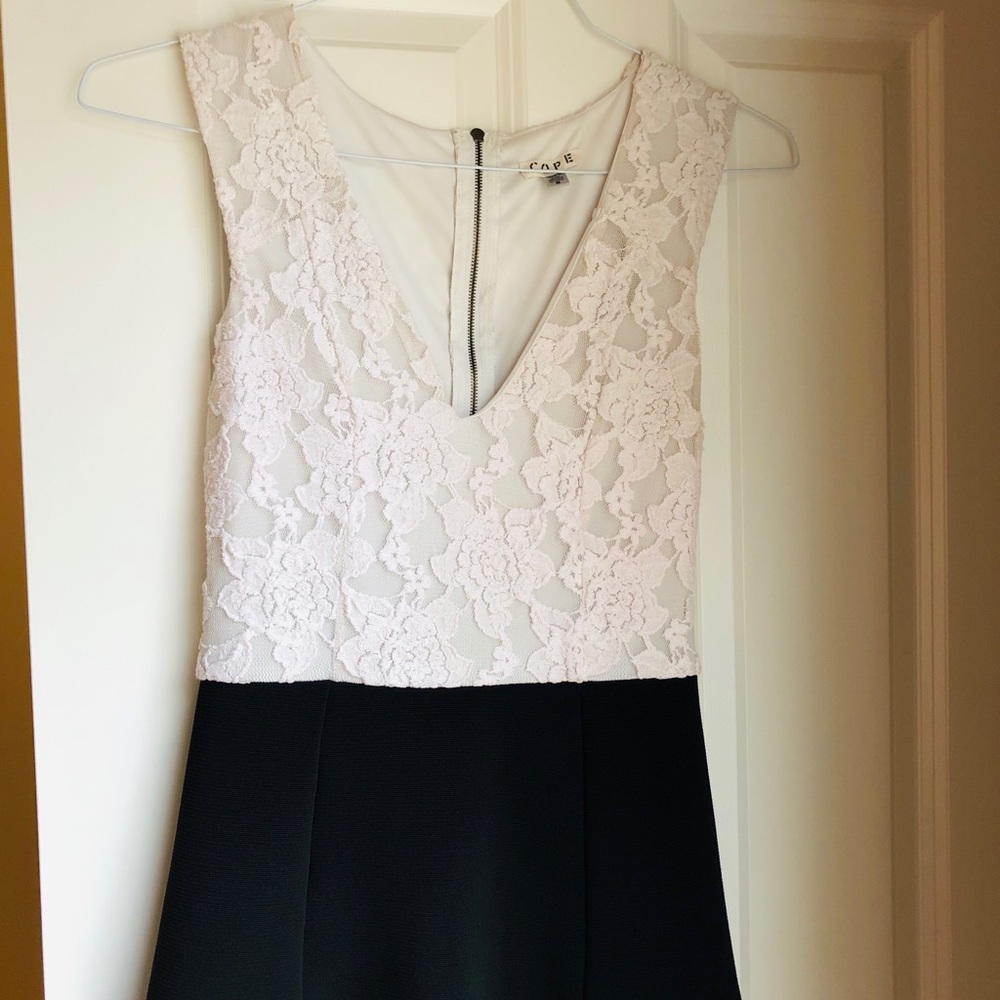White lace and black bottom romper